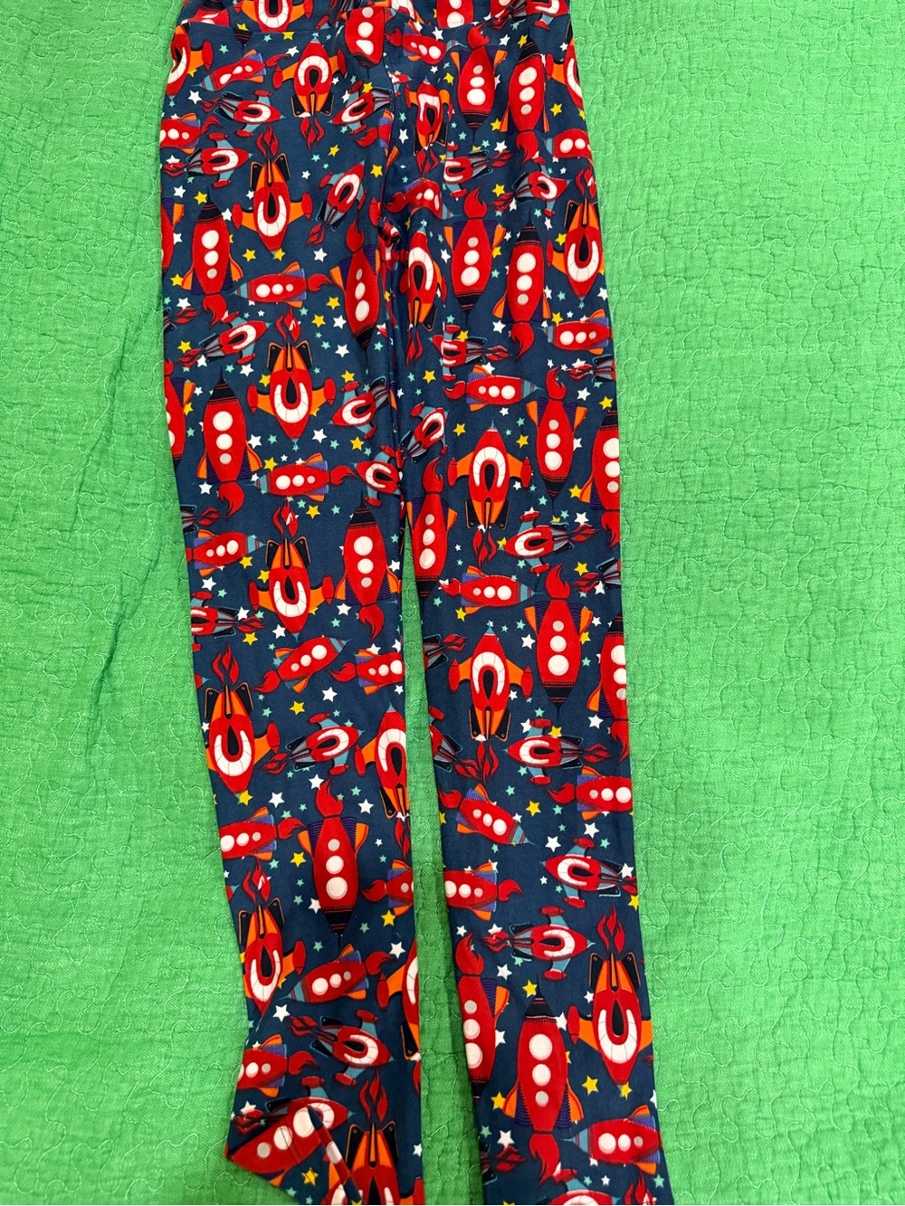 LuLaRoe Navy Leggings with Red Rocket Print